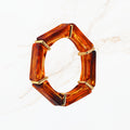Seyso amberbruine elastische statement armband voor dames met gouden details