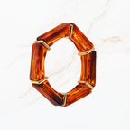 Seyso amberbruine elastische statement armband voor dames met gouden details