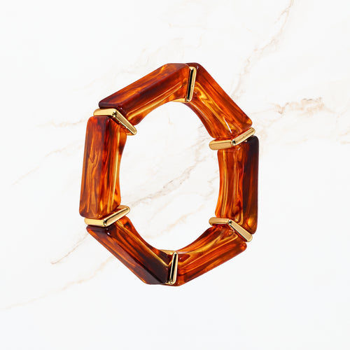 Seyso amberbruine elastische statement armband voor dames met gouden details
