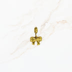 Seyso gouden strik stainless steel bedeltje uit Design Your Own collectie