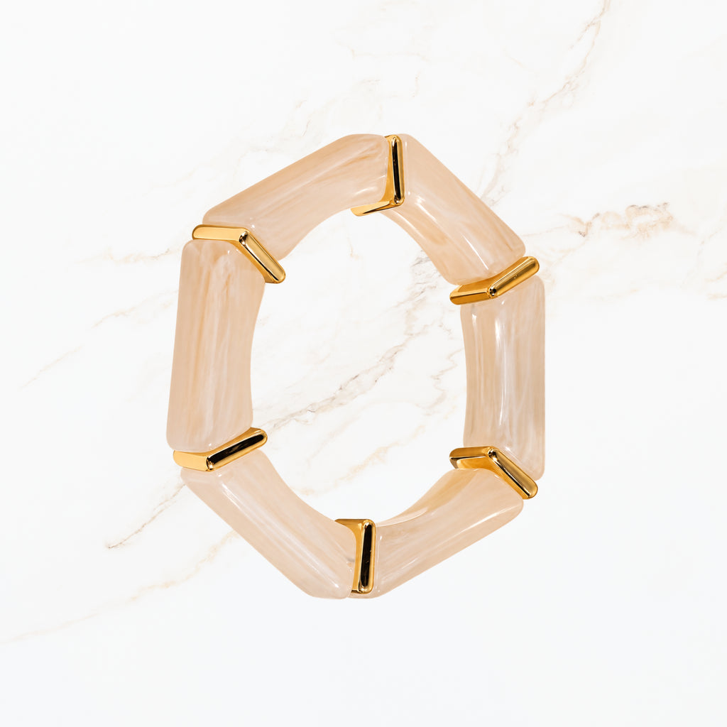 Seyso beige crème elastische armband voor dames met goudkleurige details