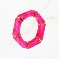 Seyso donkerroze elastische armband voor dames met goudkleurige details