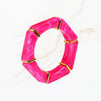 Seyso donkerroze elastische armband voor dames met goudkleurige details