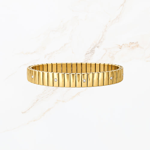 Elastische goudkleurige bangle met steentjes gedetailleerde productweergave