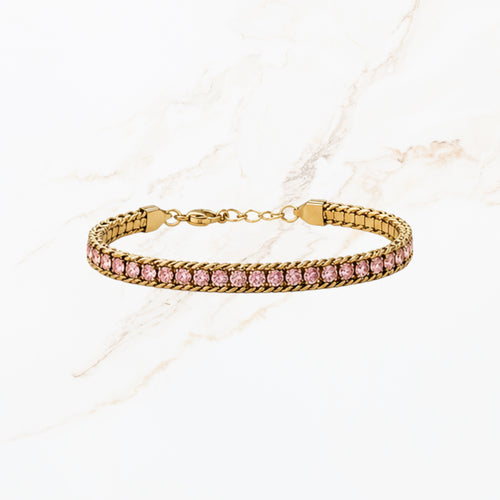 Goudkleurige armband met roze steentjes gedetailleerde productweergave