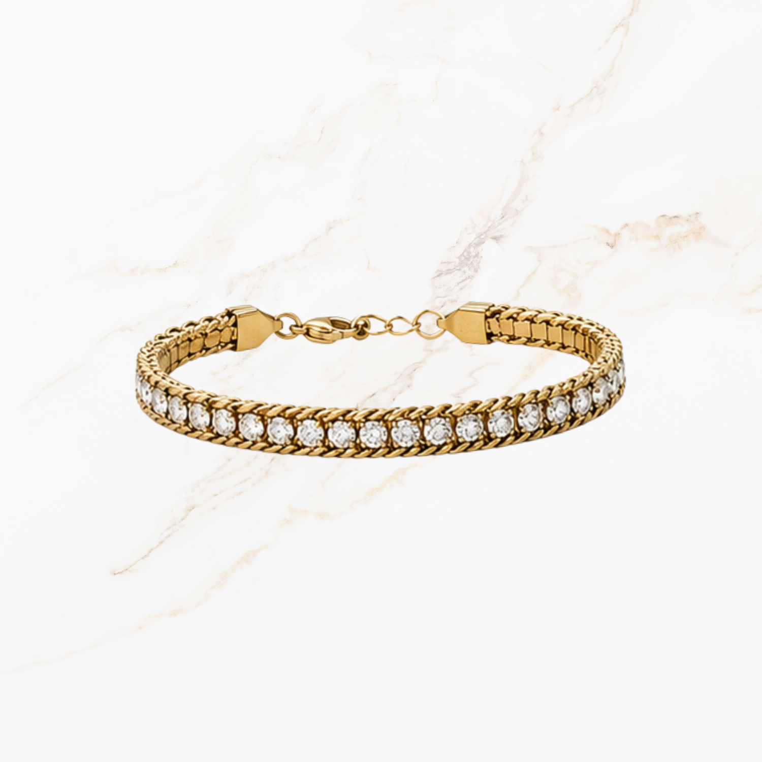 Goudkleurige armband met witte steentjes
