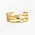 Goudkleurige bangle met die lagen
