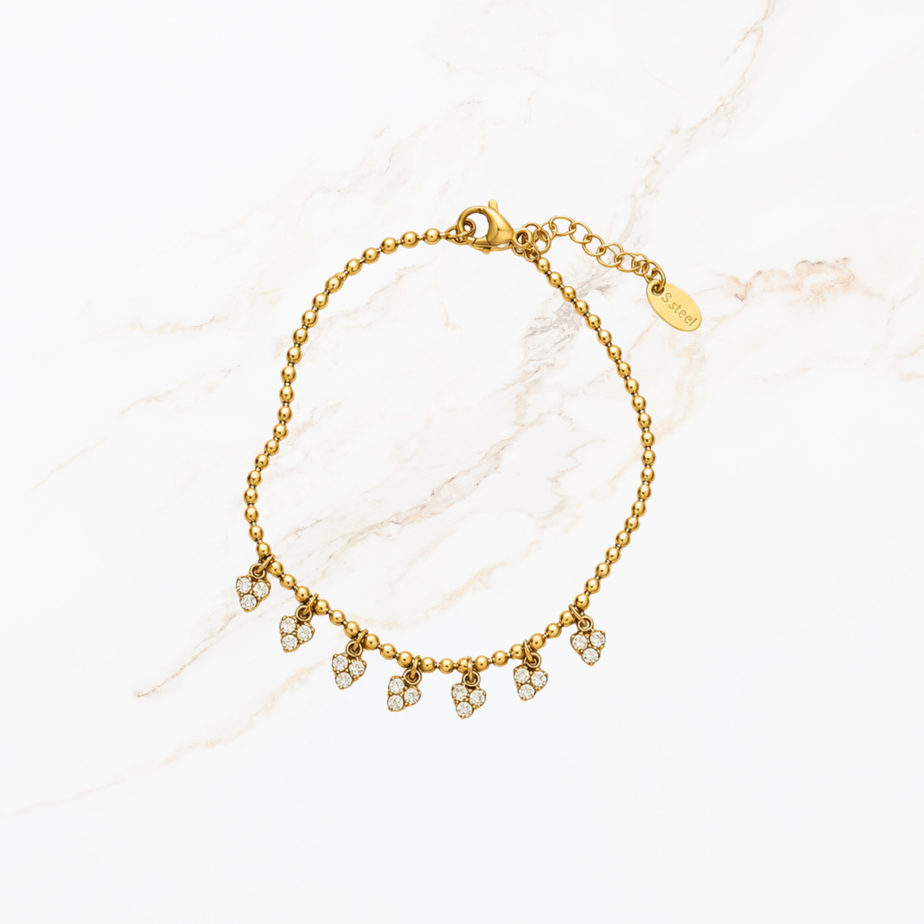 Goudkleurige minimalistische driehoek bedel armband met steentjes