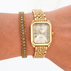 Seyso horloge met witte wijzerplaat en gouden schakelband