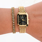 Seyso horloge met zwarte wijzerplaat en gouden band