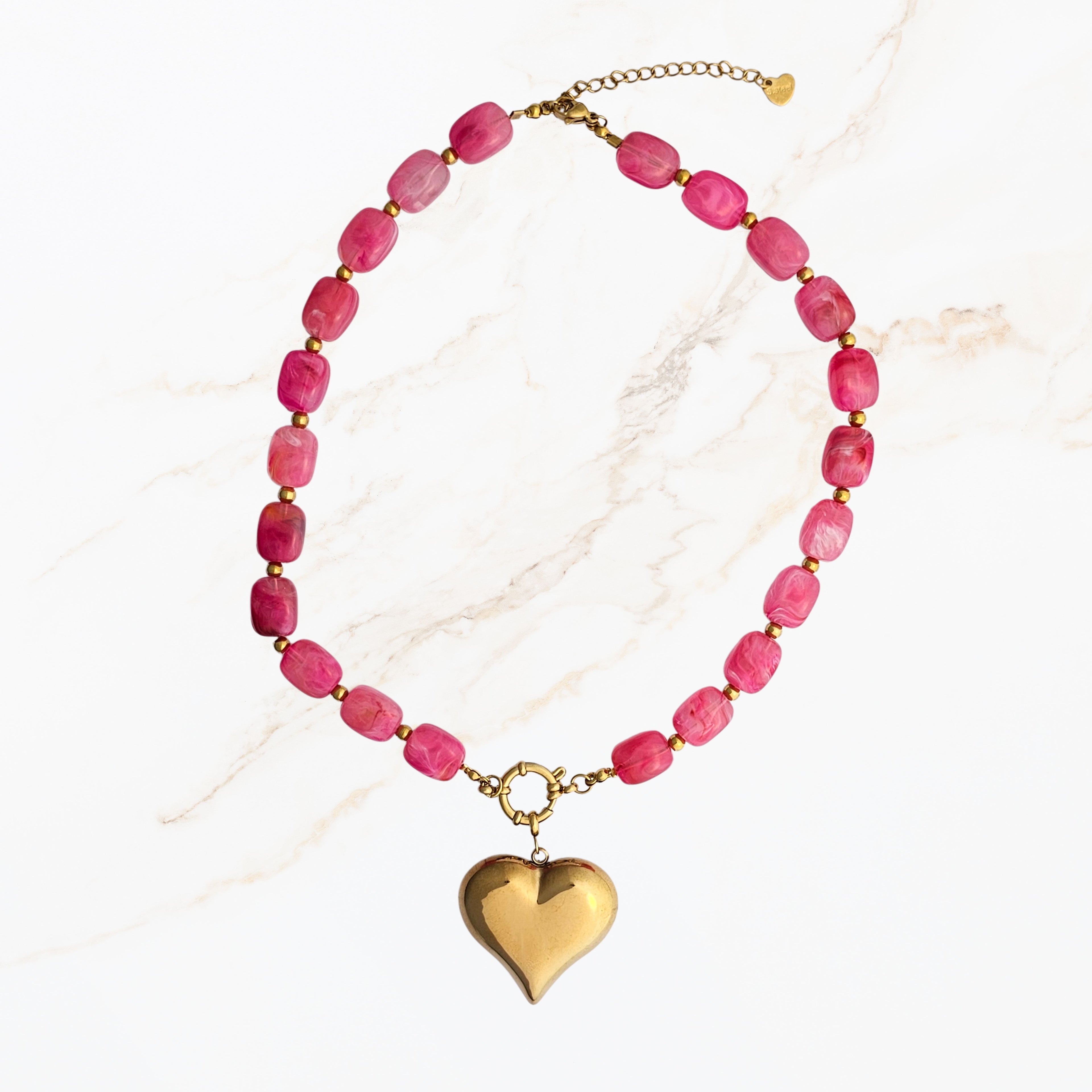 Roze ketting met goudkleurige bedel