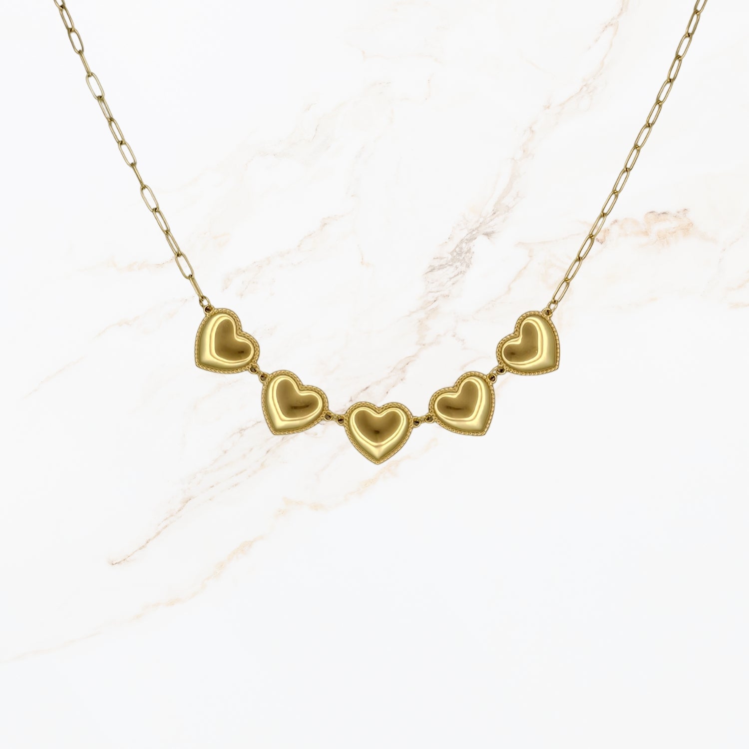 Goudkleurige stainless steel schakelketting van 45 cm plus 5 cm met meerdere hartvormige schakels