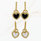 Seyso gouden hoop oorbellen met omkeerbaar hart hangertje zwart en parelmoer wit van stainless steel.