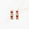 Seyso mini hoops met roze hartjes in goudkleurige setting klein model
