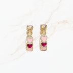 Seyso mini hoops met roze hartjes in goudkleurige setting klein model