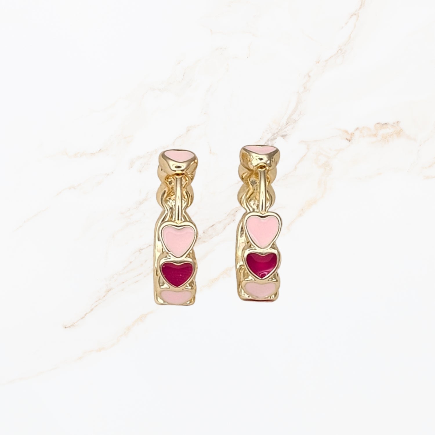 Seyso mini hoops met roze hartjes in goudkleurige setting klein model