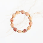 Oranje roze kralen armband