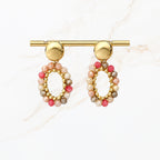 Ovale oorbel met Roze, beige, grijze kralen