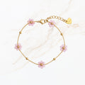 Paarse bloem kralen armband