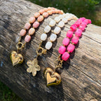 Roze ketting met goudkleurige bedel