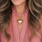 Roze ketting met goudkleurige bedel