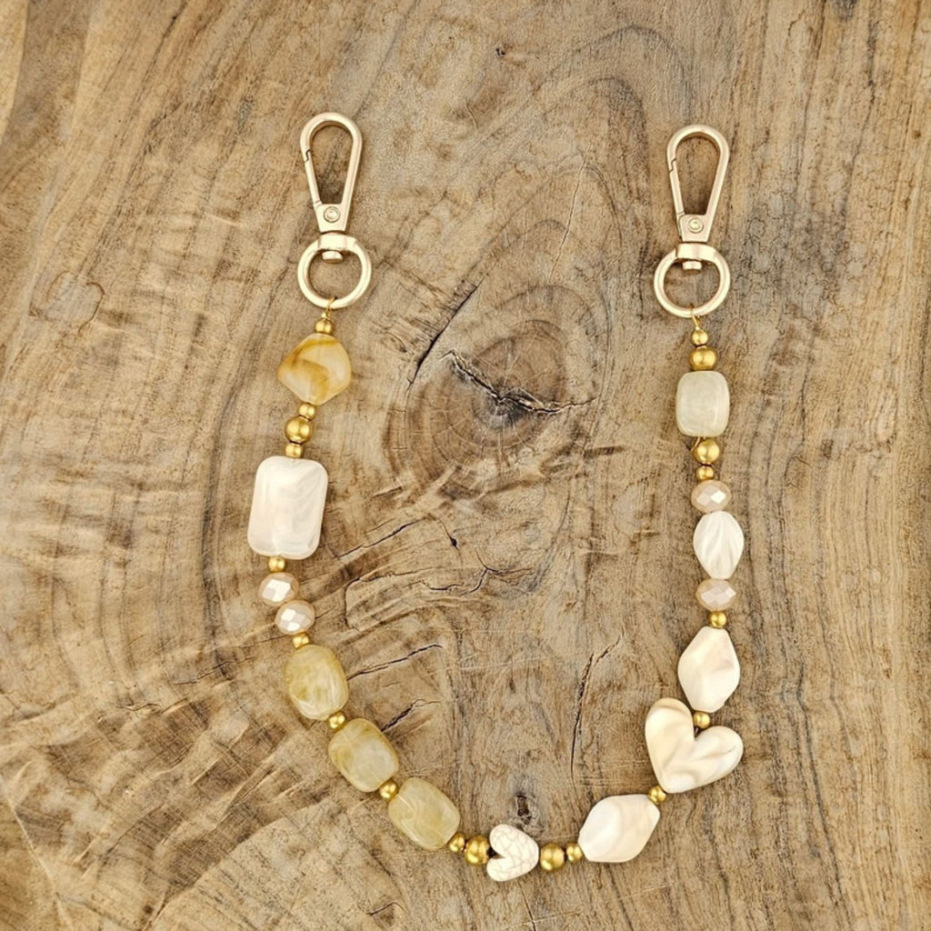 Crème beige kralen telefoonkoord te gebruiken als tas accessoire en sleutelhanger