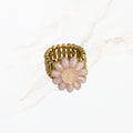 Lichtroze bloem ring met strass stenen