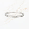 Zilverkleurige bangle met hartjes
